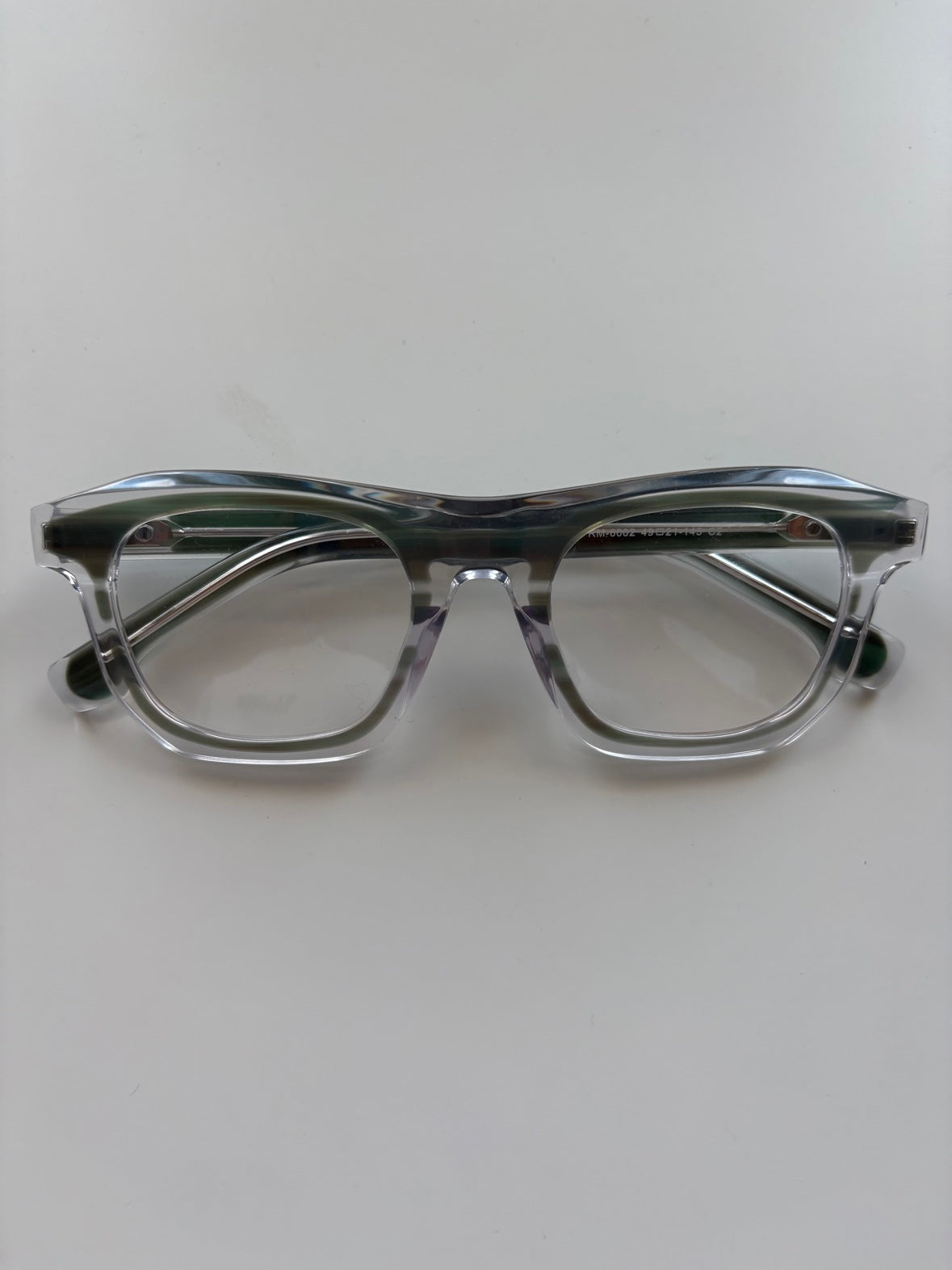Rive - Clear / Green Laminate, front